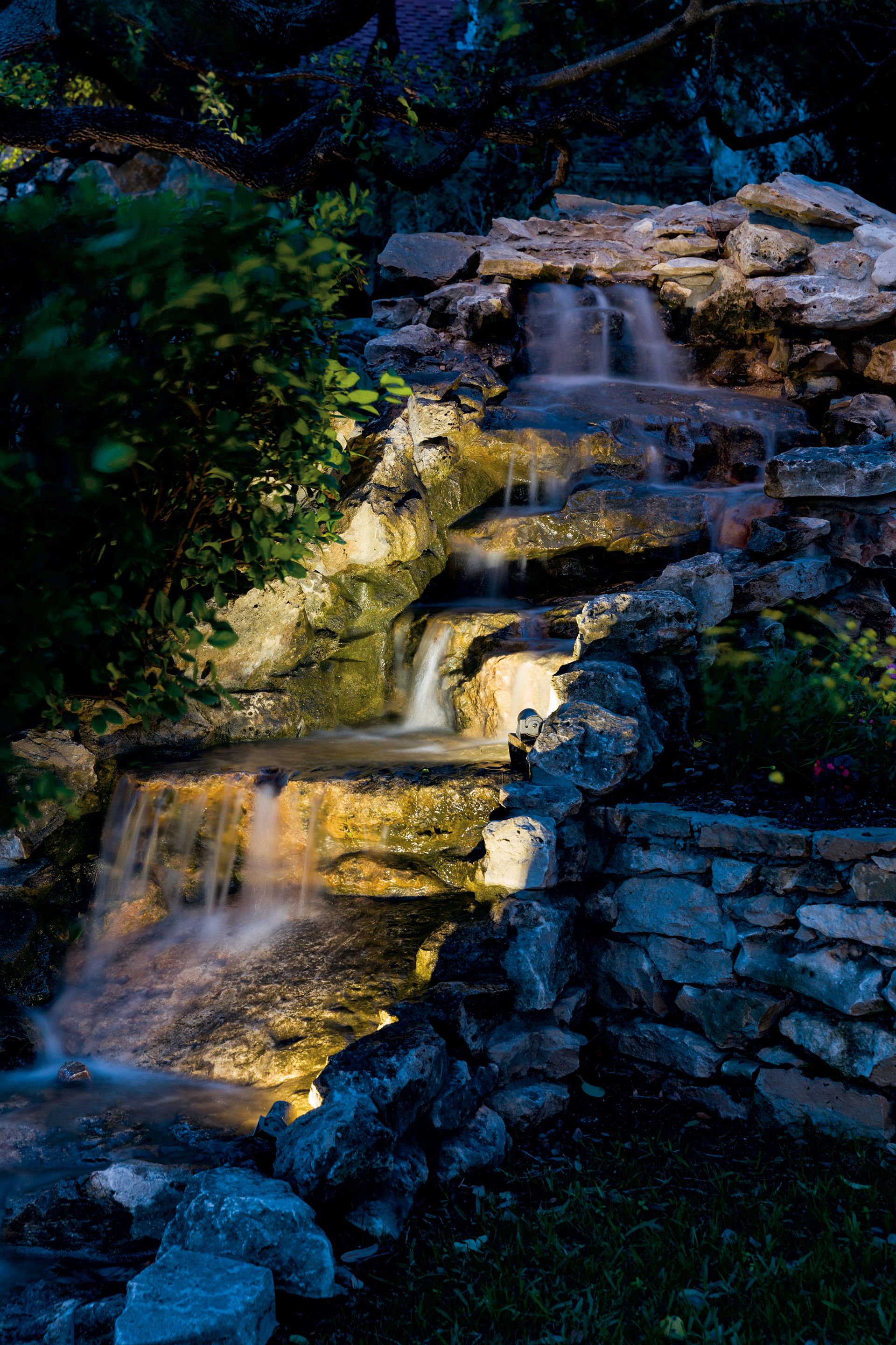illuminated stone waterfall