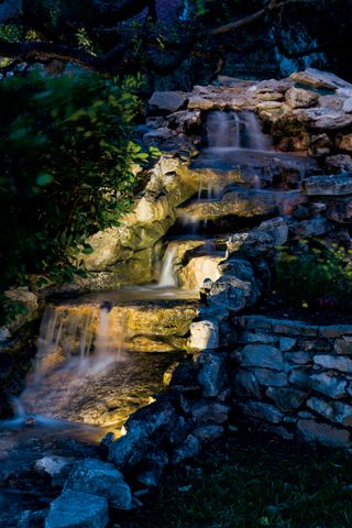 illuminated stone waterfall