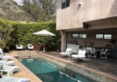 the pool and outdoor kitchen