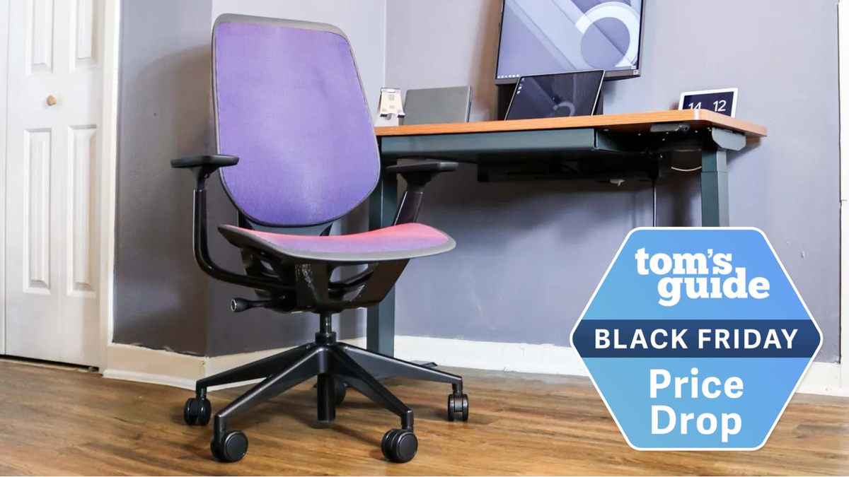 A Steelcase Karman chair in a home office with a deal badge