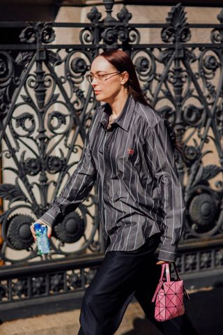 woman wearing striped linen shirt