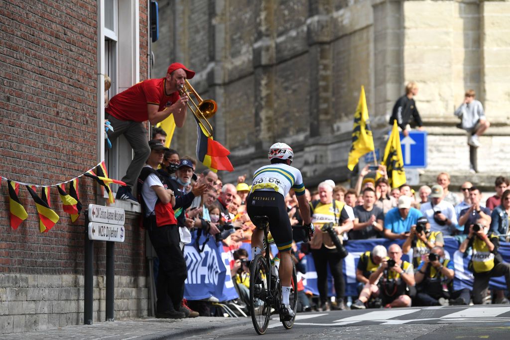 LEUVEN BELGIUM SEPTEMBER 26 A fan plays a trumpet while Nathan Haas of Australia competes during the 94th UCI Road World Championships 2021 Men Elite Road Race a 2683km race from Antwerp to Leuven flanders2021 on September 26 2021 in Leuven Belgium Photo by Tim de WaeleGetty Images