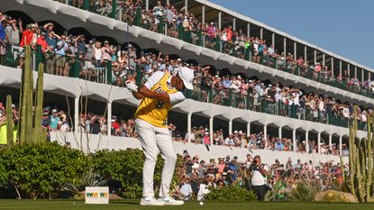 Tony Finau tees off at the 16th hole at TPC Scottsdale