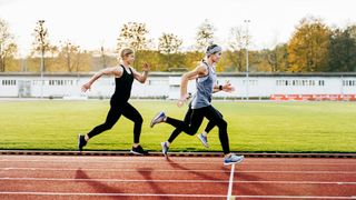 Women running on a track together