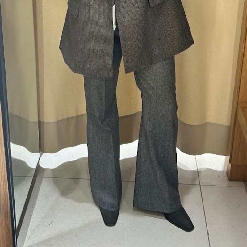 Image of grey trousers
