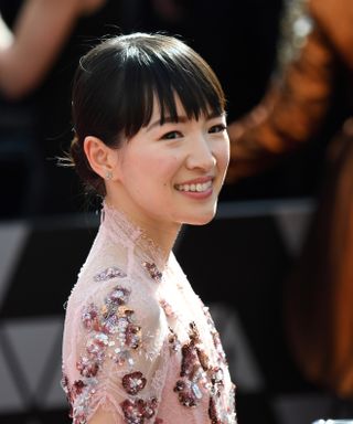 Marie Kondo on a red carpet at the Oscars