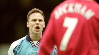 18 Nov 2000: Paul Dickov of Manchester City argues with David Beckham of Manchester United during the FA Carling Premier League match played at Maine Road in Manchester, England. United won the game 1-0. \ Mandatory Credit: Shaun Botterill /Allsport