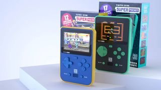 Two Super Pocket handheld consoles in green and black and yellow and blue with white backdrop