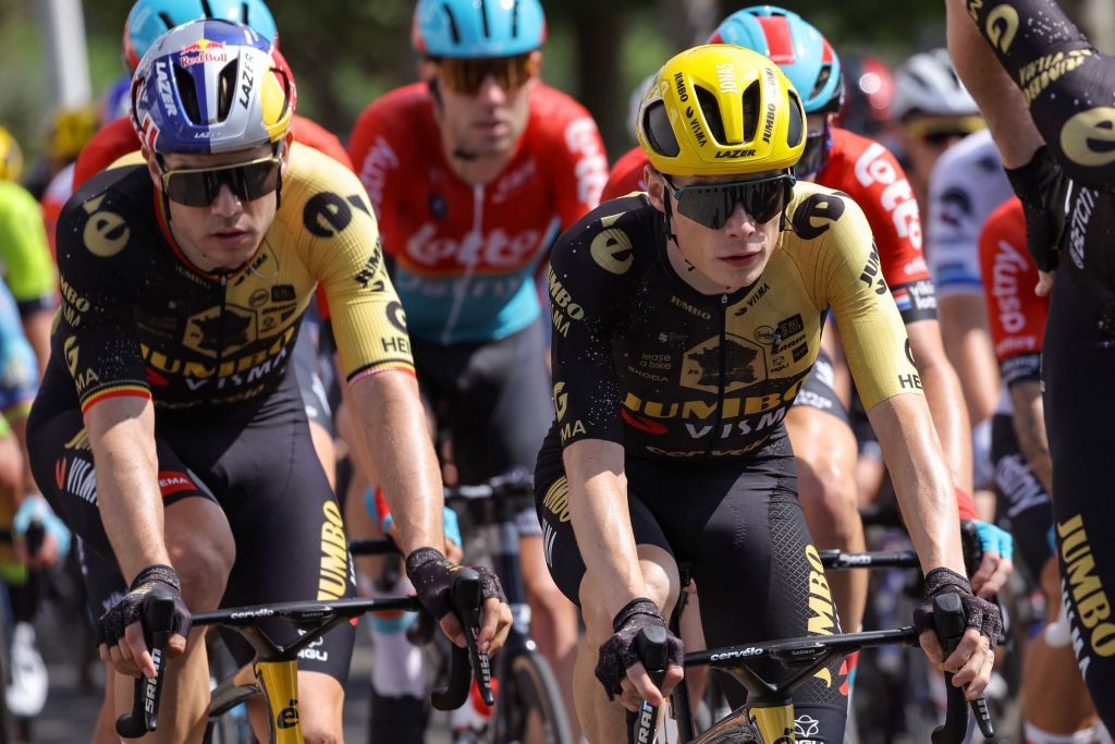 JumboVismas Danish rider Jonas Vingegaard R and JumboVismas Belgian rider Wout Van Aert L cycle with the pack of riders in Hendaye during the 3rd stage of the 110th edition of the Tour de France cycling race 1935 km between AmorebietaEtxano in Northern Spain and Bayonne in southwestern France on July 3 2023 Photo by Thomas SAMSON AFP Photo by THOMAS SAMSONAFP via Getty Images