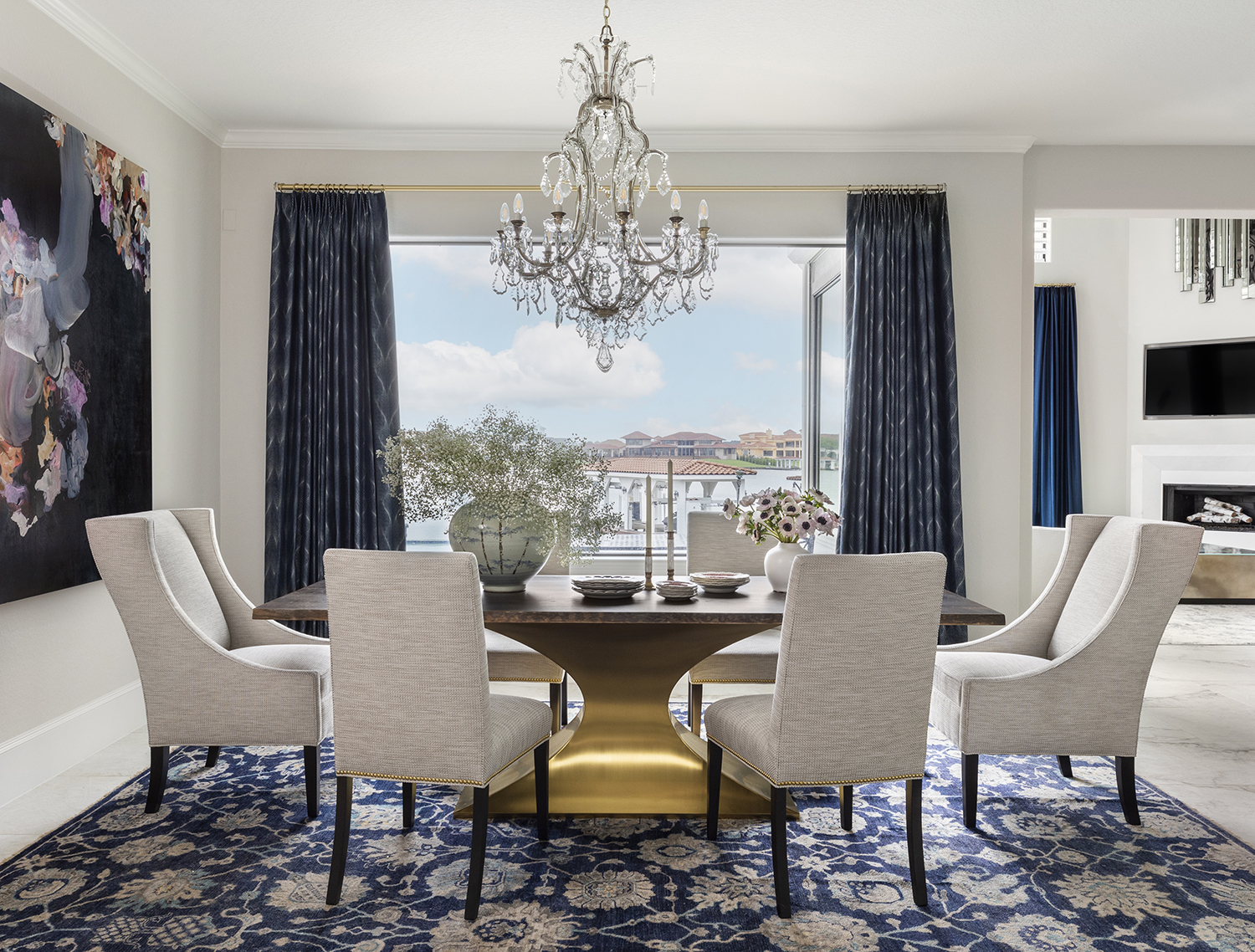 formal dining room with blue curtains