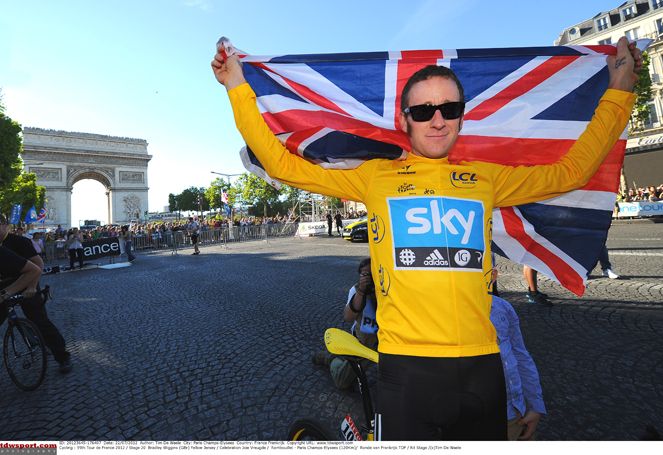 Wiggins in a patriotic moment of celebration in 2012