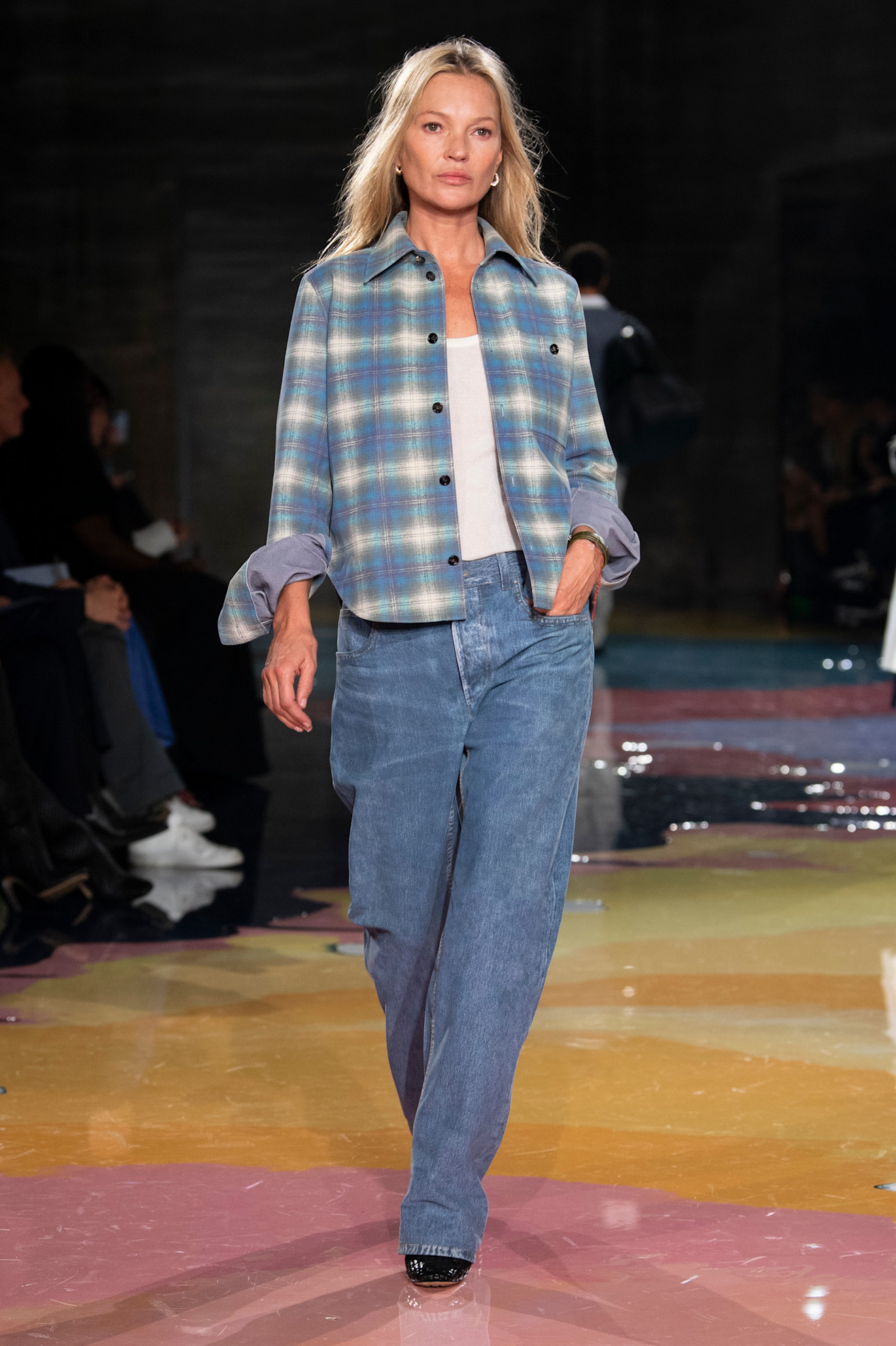 An image of Kate Moss wearing the flannel shirt trend on the Bottega Veneta spring/summer 2023 runway.