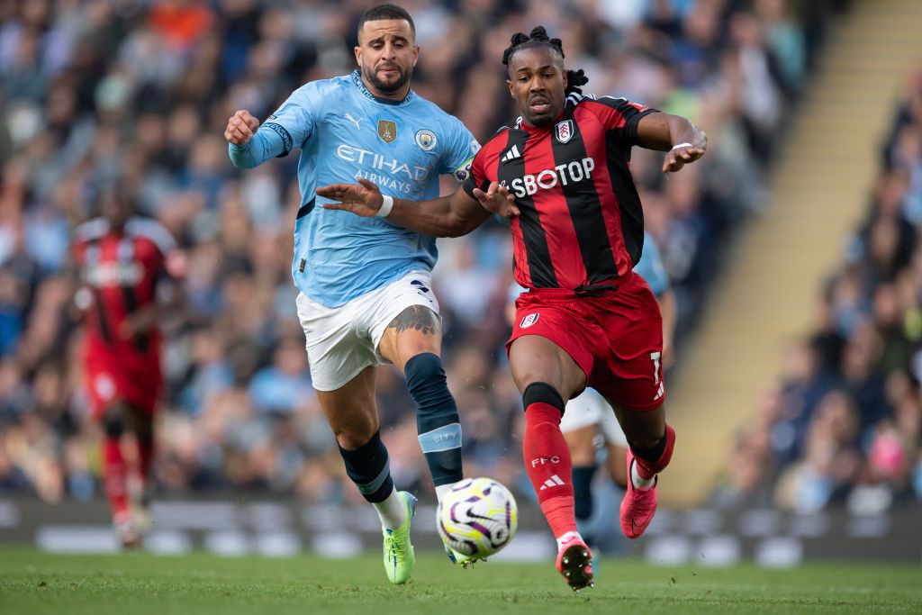 MANCHESTER, ENGLAND - OCTOBER 5: Kyle Walker of Manchester City battles for possession with Adama Traore of Fulham during the Premier League match between Manchester City FC and Fulham FC at Etihad Stadium on October 5, 2024 in Manchester, England. (Photo by Joe Prior/Visionhaus via Getty Images)