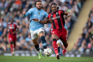 MANCHESTER, ENGLAND - OCTOBER 5: Kyle Walker of Manchester City battles for possession with Adama Traore of Fulham during the Premier League match between Manchester City FC and Fulham FC at Etihad Stadium on October 5, 2024 in Manchester, England. (Photo by Joe Prior/Visionhaus via Getty Images)