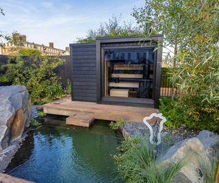 Sauna and pond in the Finnish Soul Garden at RHS Chelsea Flower Show 2021