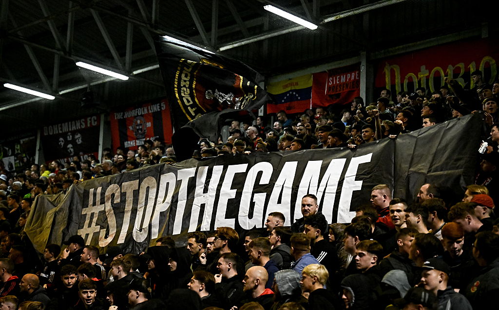 Bohemians supporters display a banner, protesting the upcoming Republic of Ireland matches against Israel, during the SSE Airtricity Men's Premier Division match between Bohemians and Drogheda United at Dalymount Park in Dublin.