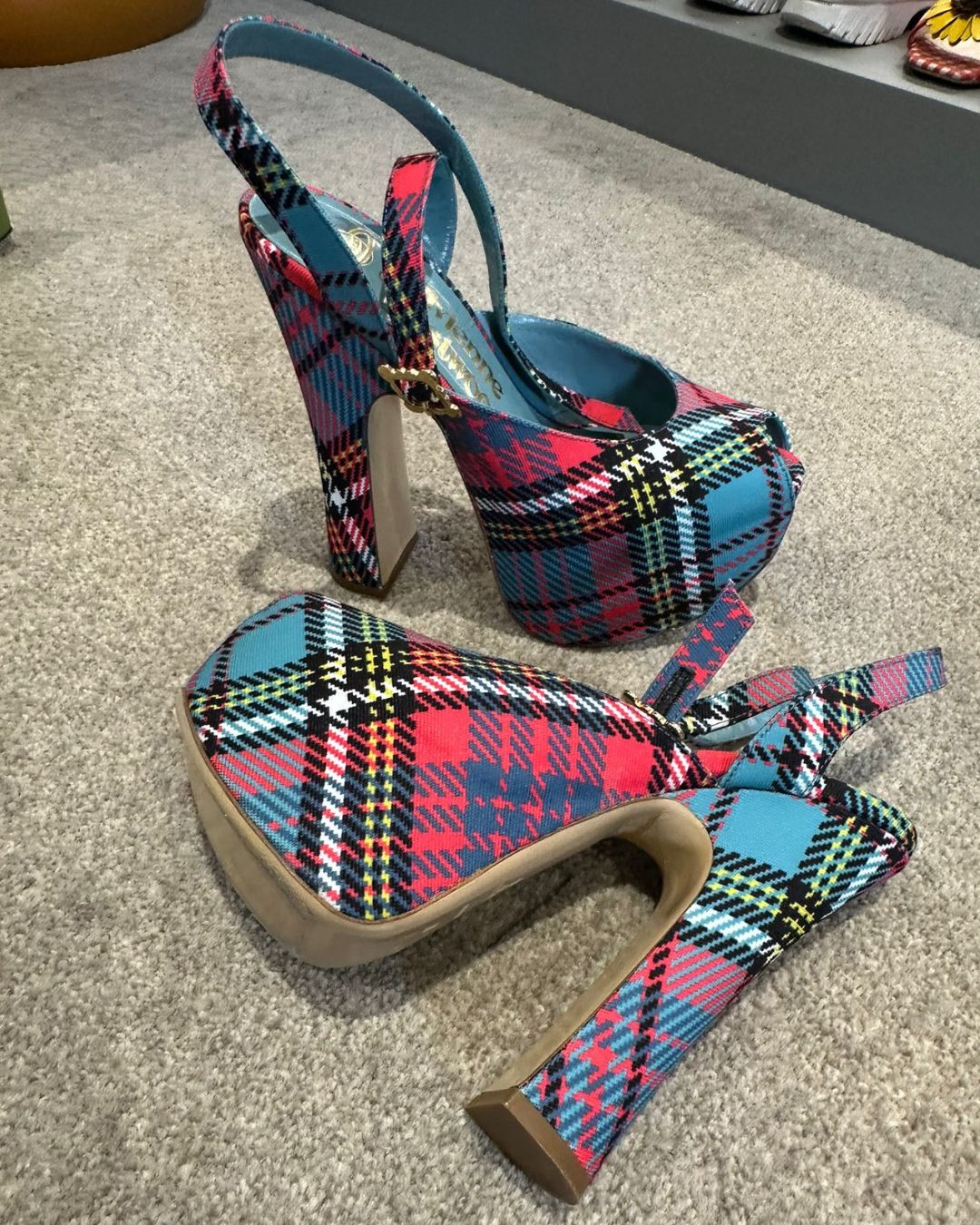 a pair of vivenne westwood tartan platform heels owned by candice brathwaite