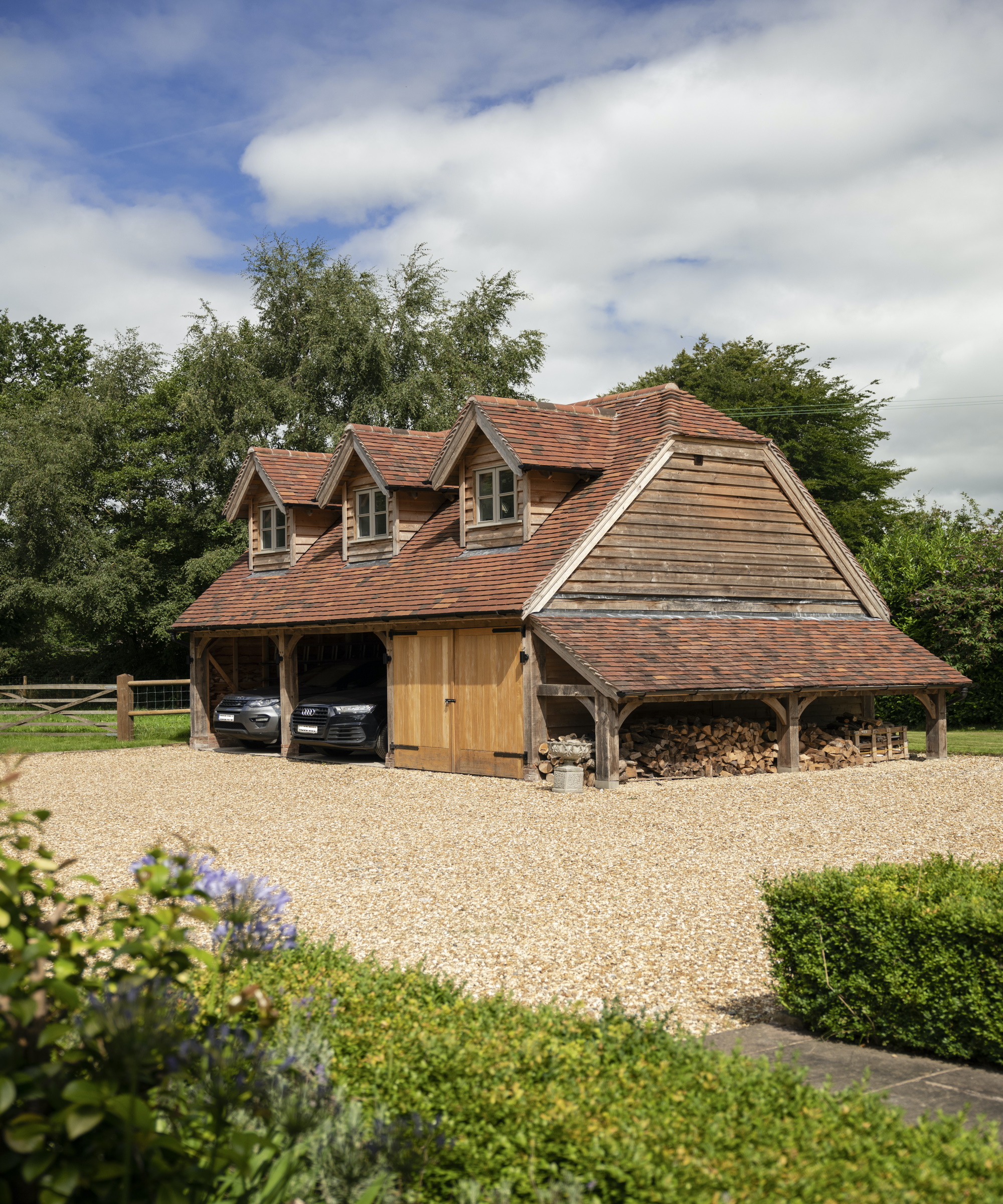 Log store combined with garage storage ideas and extra living space