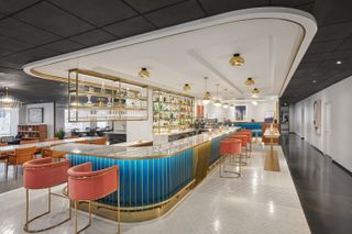 Expensify's curved bar counter at new office entrance lounge