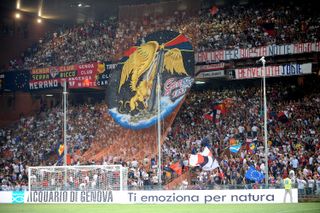 Genoa fans unfurl a tifo ahead of a Europa League match against Odense in August 2009.