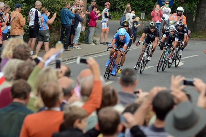 Dylan van Baarle leads the bunch on stage 7