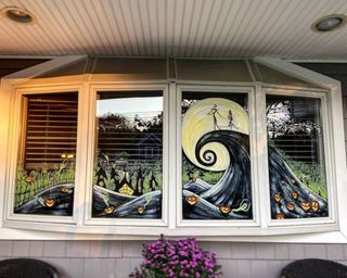 Halloween window painting ideas depicting Nightmare Before Christmas scene