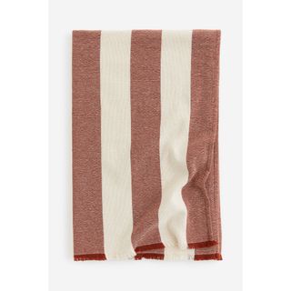 A red and white striped throw