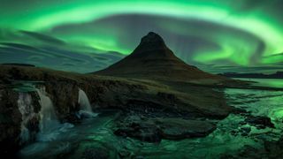 the northern lights in Kirkjufell, near Grundarfjordur, Iceland