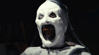 Close-up of Art The Clown with his eyes and mouth wide open in Terrifier 3