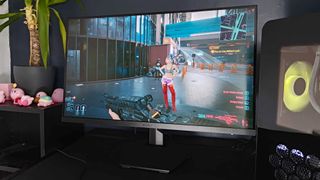 KOORUI GN02 monitor with Cyberpunk 2077 gameplay on screen