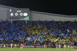 Maccabi Tel Aviv fans cheer on their team during a Europa Conference League game against PSV Eindhoven at the Bloomfield Stadium in February 2022.