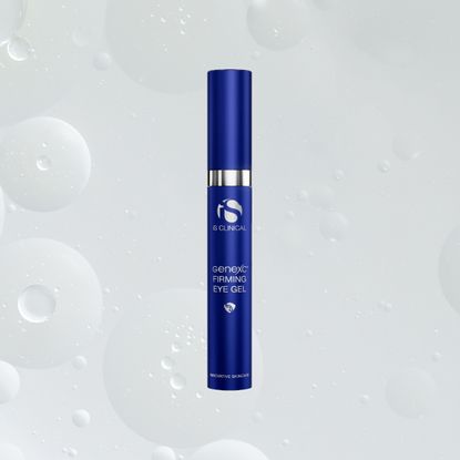 a blue tube of eye cream on top of a white background