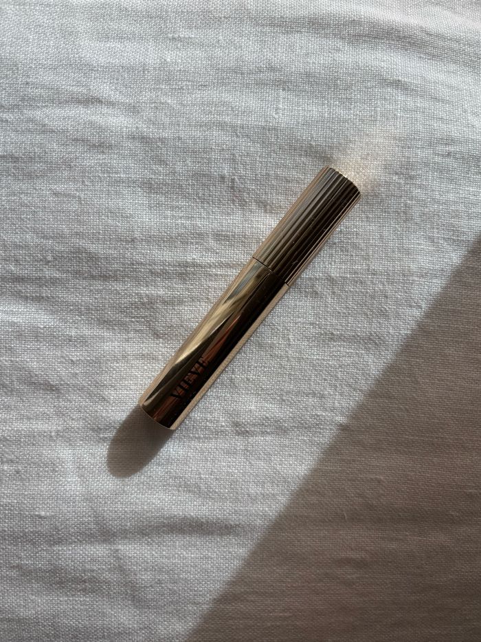 The xx brow gel on a white linen background