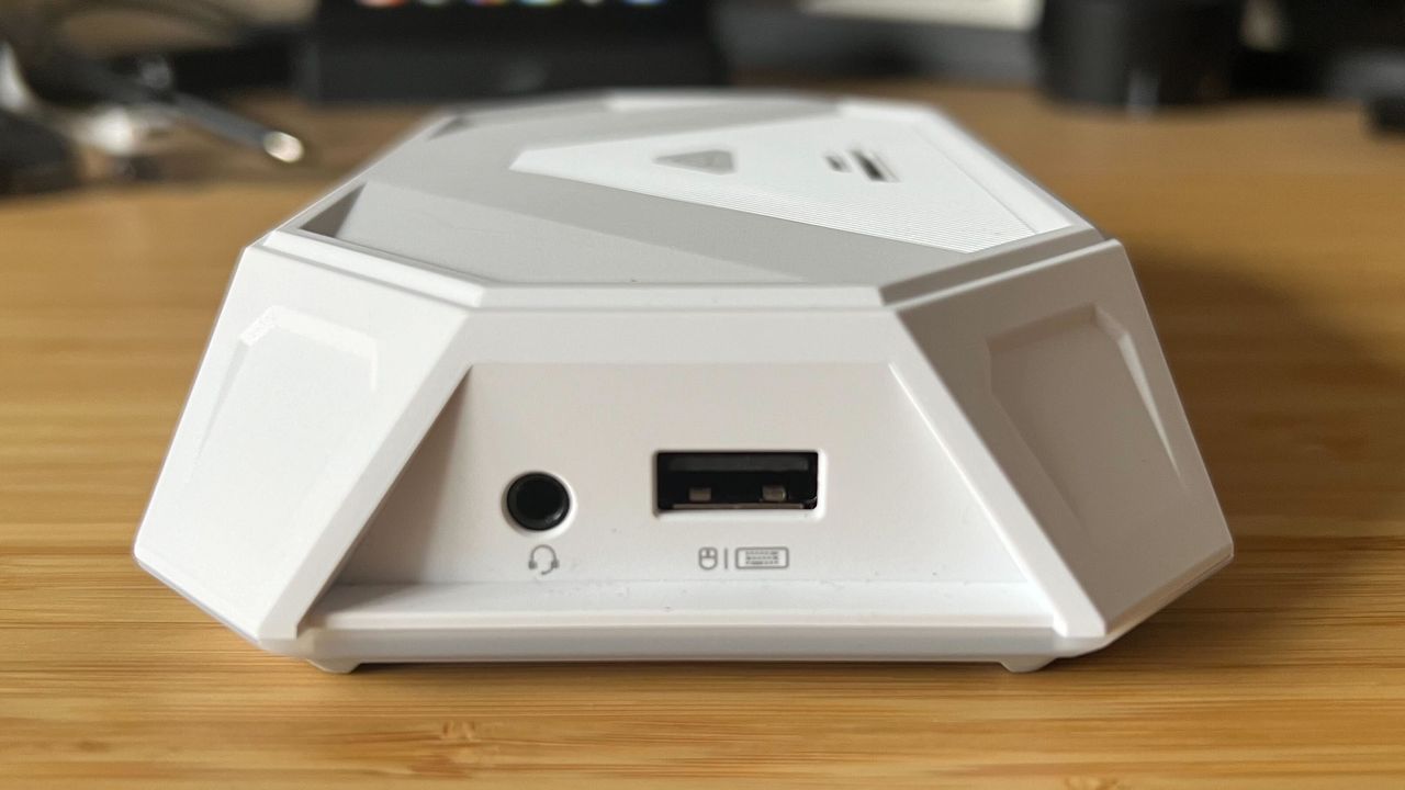 Side of JSAUX RGB Docking Station showing USB and audio ports