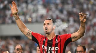 REGGIO NELL'EMILIA, ITALY - MAY 22: Zlatan Ibrahimovic of AC Milan celebrates with a cigar after their side finished the season as Serie A champions during the Serie A match between US Sassuolo and AC Milan at Mapei Stadium - Citta' del Tricolore on May 22, 2022 in Reggio nell'Emilia, Italy. (Photo by Chris Ricco/Getty Images)