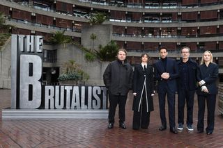 LONDON, ENGLAND - JANUARY 15: Brady Corbet, Felicity Jones, Adrien Brody, Guy Pearce and Mona Fastvold attend "The Brutalist" photocall at The Barbican Centre on January 15, 2025 in London, England. (Photo by Joe Maher/Getty Images)