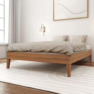 A platform bed with a matte pecan finish