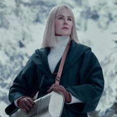 nicole kidman as masha standing on a snowy alp in a coat and turtle neck in nine perfect strangers season 2