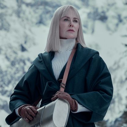 nicole kidman as masha standing on a snowy alp in a coat and turtle neck in nine perfect strangers season 2
