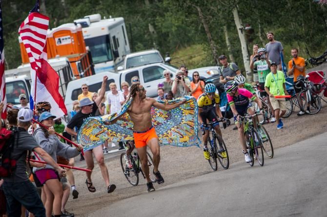 The leaders get cheered by fans on the last KOM