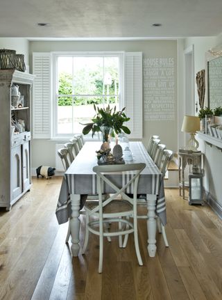 farmhouse style dining room with wall typography