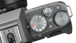 The X-T100 has a regular mode dial rather than the separate shutter speed and aperture dials found further up the range