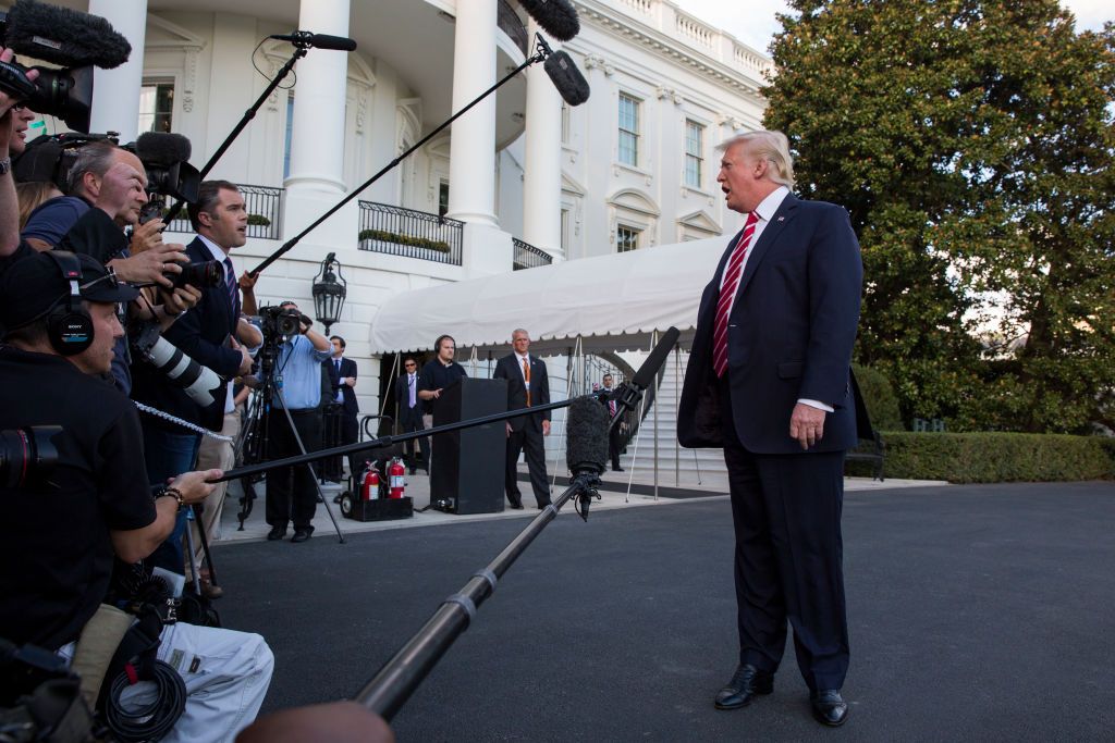 President Trump speaks with the press at the White House