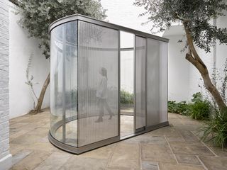 Dan Graham Play Pen for Play Pals, 2018 Stainless steel, perforated metal, glass and two-way mirror. © Dan Graham, Courtesy Lisson Gallery