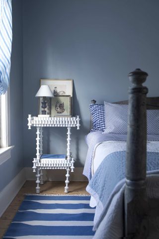 Little Boy Blue is a light blue painted on the walls in this bedroom