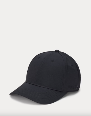 a black baseball cap on a plain backdrop