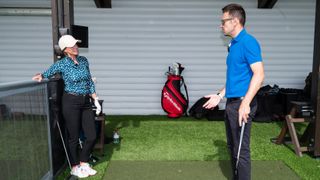 Nick Dougherty giving a lesson to Golf Monthly reader Amanda Rowley