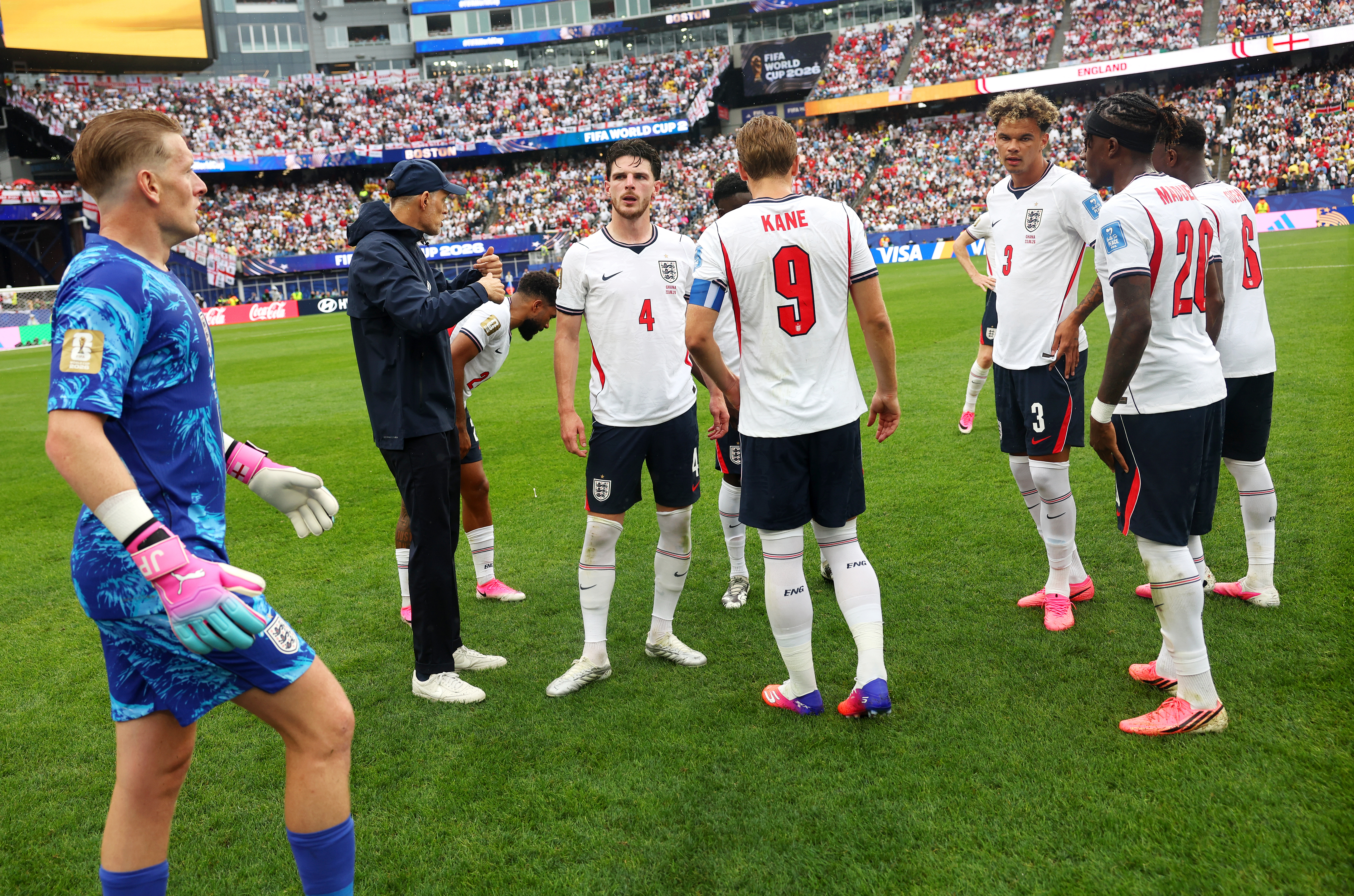 Thomas Tuchel speaks with Declan Rice, Harry Kane, Nico O'Reilly and Noni Madueke during the World Cup 2026 match between England and Ghana (Photo by Eddie Keogh - The FA/The FA via Getty Images)