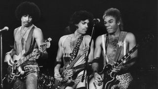 Prince performing with André Cymone (left) and Dez Dickerson, on the Dirty Mind Tour, USA, 1981