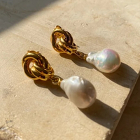 Chunky Knot Baroque Pearl Earrings, £72 ($91) | Shyla